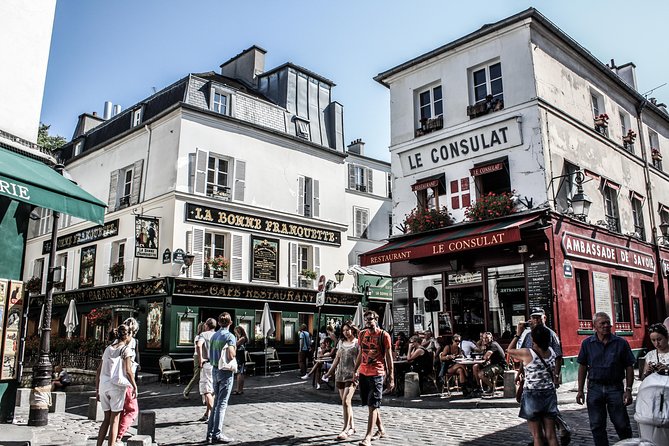 Montmartre District and Sacre Coeur - Exclusive Guided Walking Tour - Place Abbesses and the Art Nouveau metro entrance: a stylish finish