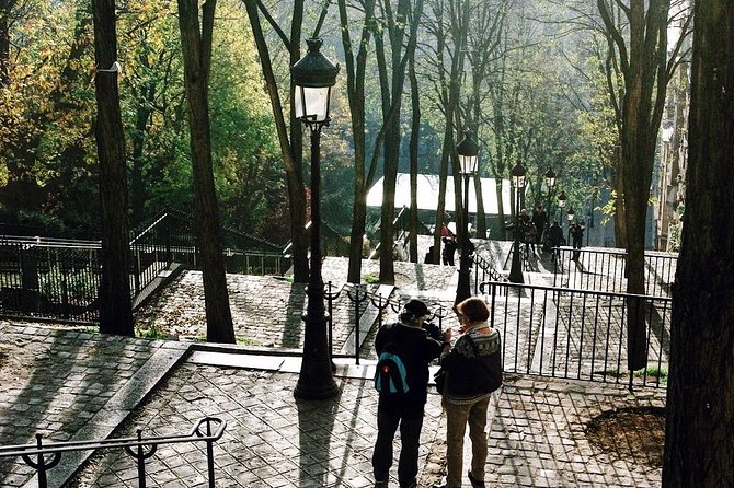 Montmartre District and Sacre Coeur - Exclusive Guided Walking Tour - Moulin Rouge, Rue Lepic, and Place Dalida: the artist vibe you get on day one