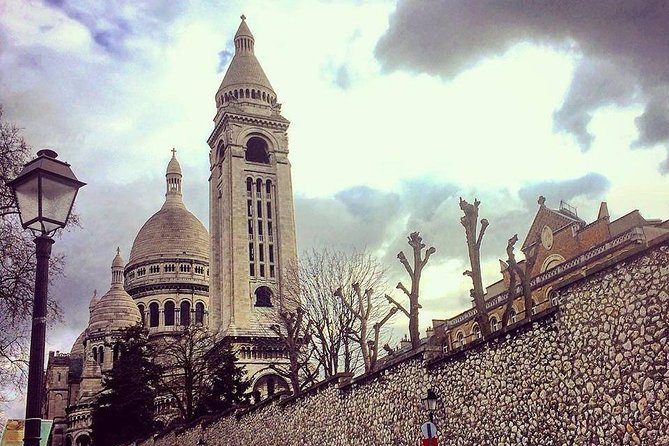 Montmartre Highlights - Bohemian Streets & Sacré-Coeur Basilica - Stop 4: Pigalle—the red-light district past, cafés, cabarets, and “pearls”