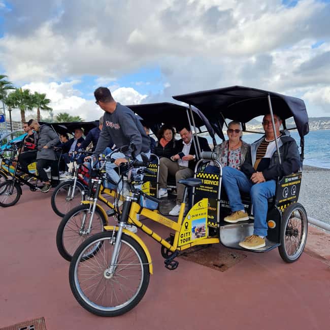 Nice: Electric Rickshaw City Tour with Local Guide - The Lu Gésù entrance and the art behind the walls