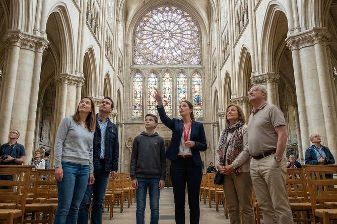 Notre Dame Cathedral:Interior & Exterior Small Group Guided Tour - Exterior walk: façade details, sculptures, rose window, and flying buttresses