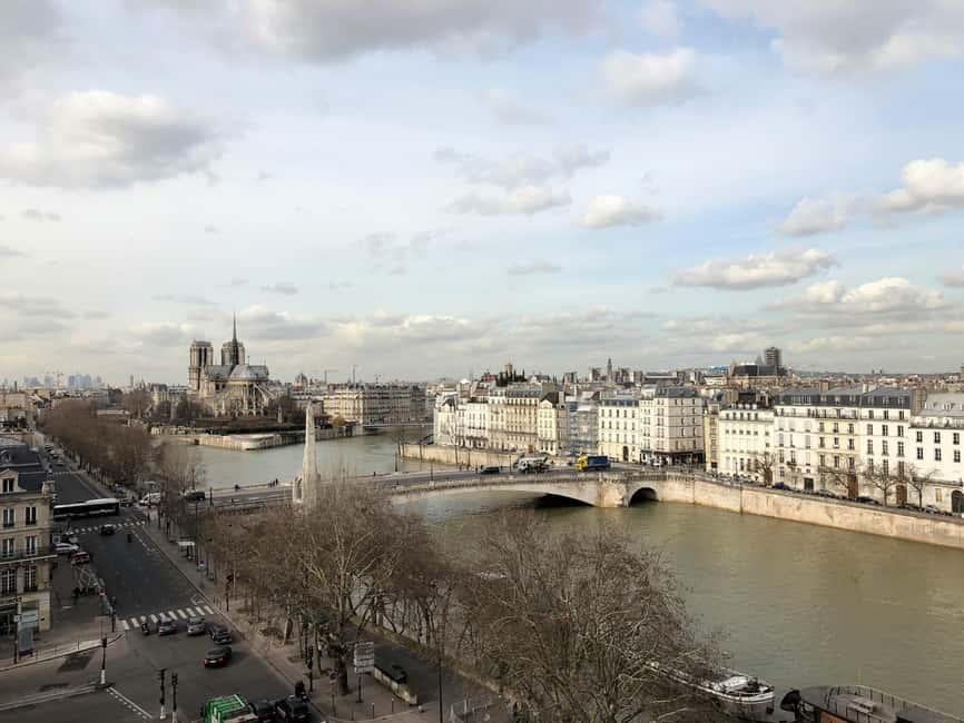 Notre-Dame Tour with Host or AudioGuide + Optional Cruise - Meeting at the Statue of Charlemagne: How the Host-Assisted Entry Works