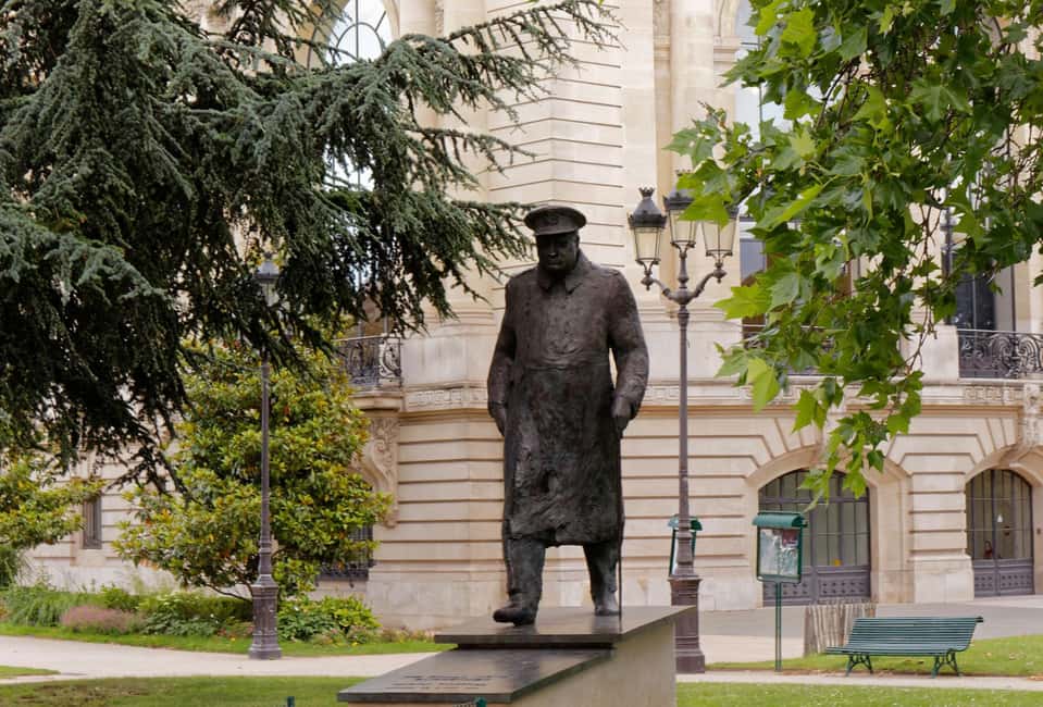 Pairs: The Opera to Hotel des Invalides Guided Walking Tour - The Champs Elysées and two exhibition palaces