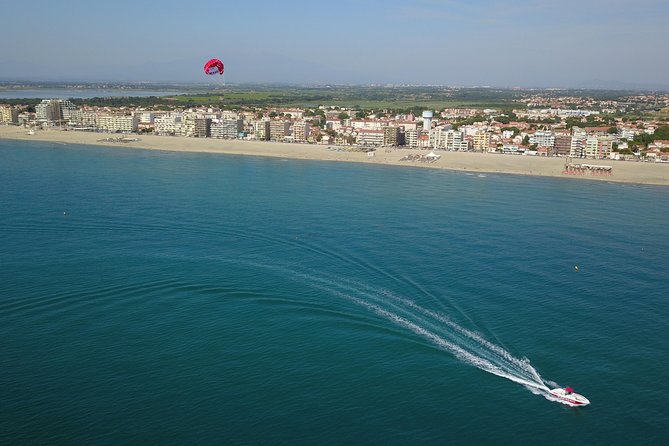 Parasailing - The 10-minute flight: controlled speed, cable height, and choosing how wet you get