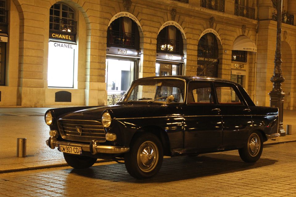 Paris: 1.5-Hour Vintage Car Night Tour - Place des Vosges gives you the tour’s best pause