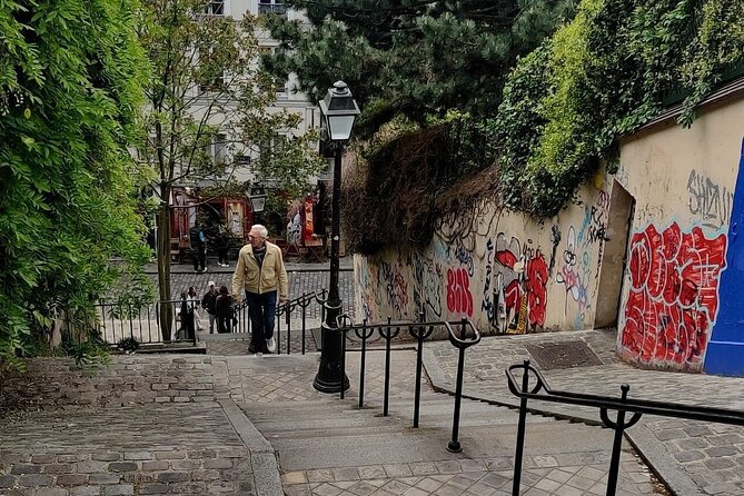 Paris Bites & Stories : A Tasty City Adventure with a Local - Rue Lepic, Amélie, and a cream-filled dessert