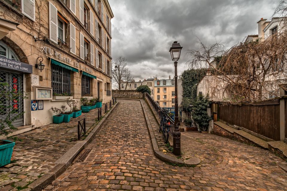 Paris: Charms of Montmartre Guided Walking Tour - The Maison Rose and Montmartre’s painted square