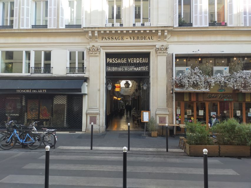 Paris: Covered Passages Walking Tour - Passage Choiseul: Sunlit Roofs, Long Shop Lines, and Downward Looks