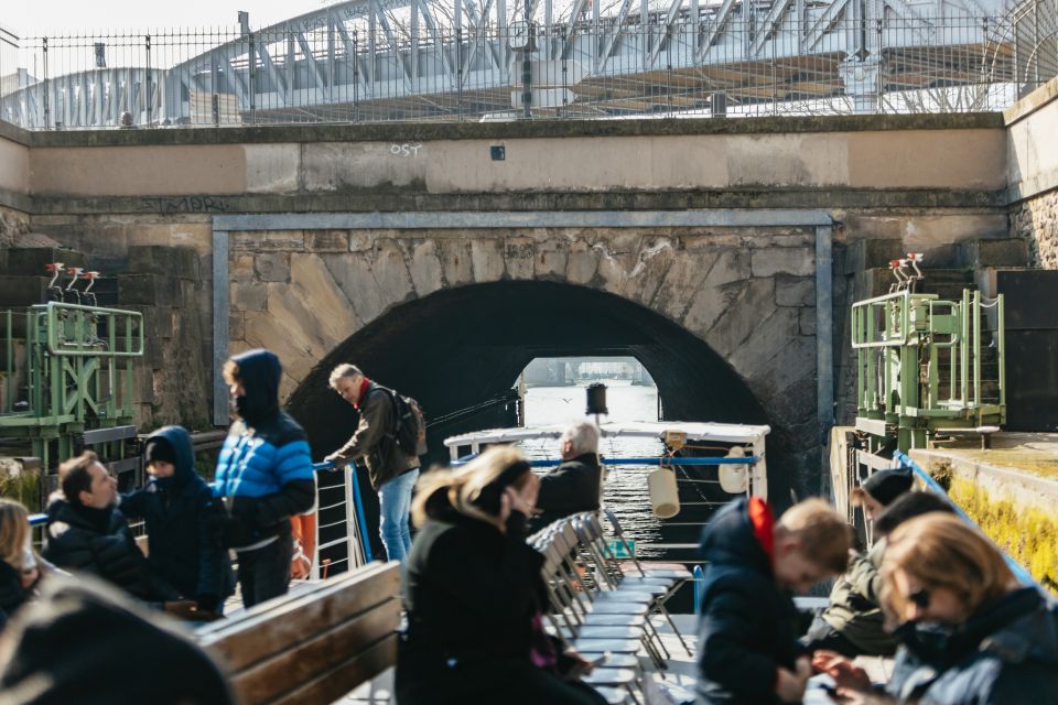 Paris: Cruise on the Saint-Martin Canal and Seine River - The underground vault: darkness, light holes, and the best photo you didn’t plan