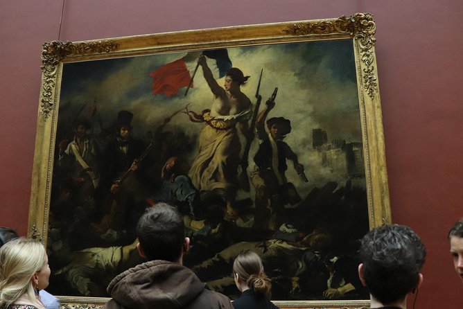 Paris Eiffel Tower, Notre Dame, Louvre and Montmartre Guided Tour - Eiffel Tower: fun facts and quick picture time