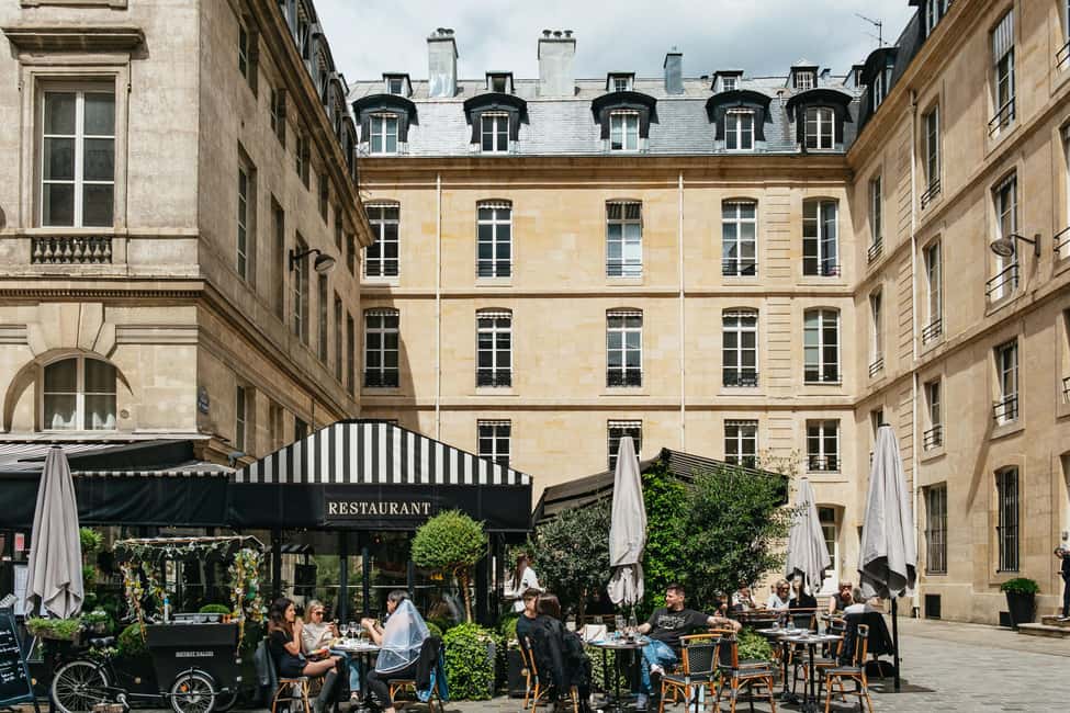 Paris: Emily TV Show Locations Guided Walking Tour - Place de Valois and 8 Rue de Montpensier: Where the Show Meets the Street Texture