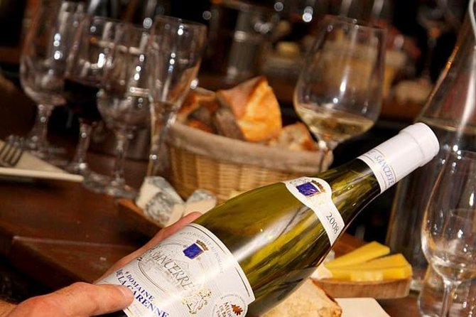 Paris French Wine Tasting 3-Course Dinner - Ô Chateau’s wine cellar setting: part tasting room, part dinner party