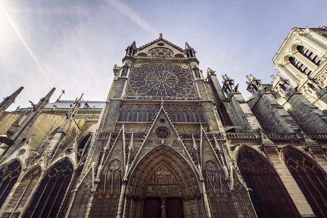Paris in a Day: Louvre or Orsay, Eiffel Tower, City Walk & Cruise - The royal chapel stop: stained glass close-up energy