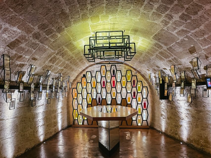 Paris: Les Caves du Louvre Guided Tour with Wine Tastings - Key highlights at a glance
