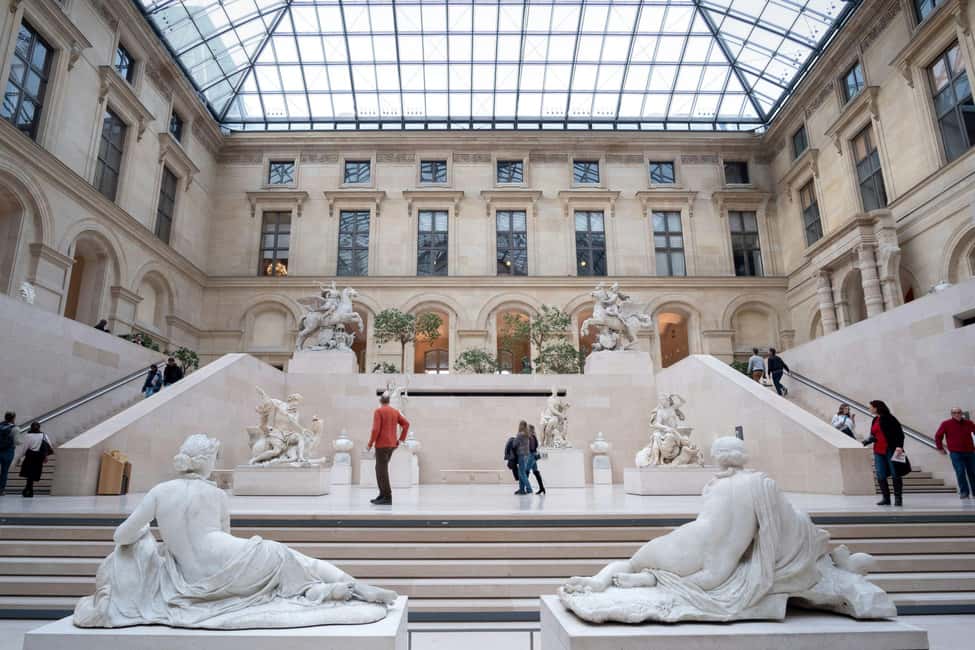 Paris: Louvre Museum Access with Host and Hop-On Hop-Off Bus - Meeting at Arc du Carrousel: your anchor point for a smooth first hour