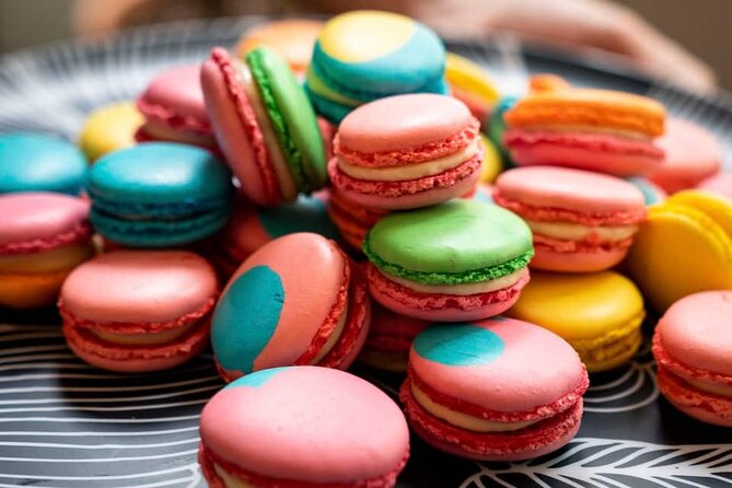 Paris Macarons Small-Group Baking Class with a Chef - Entering a macaron-focused Paris workshop near Place des Vosges