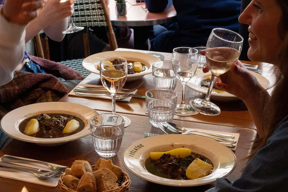 Paris: Montmartre Food Tour with Full Meal - Place du Tertre: history and a cheese stop that actually feels French