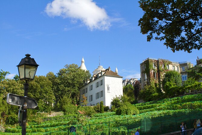 Paris Montmartre Free Walking Tour in English - Dalida, La Maison Rose, and Au Lapin Agile: The Montmartre Characters