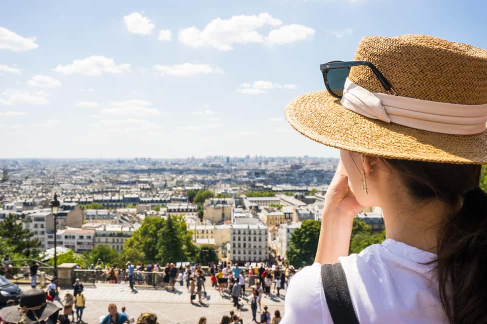 Paris: Montmartre Group Tour in German - Guided storytelling: the difference between seeing Montmartre and understanding it