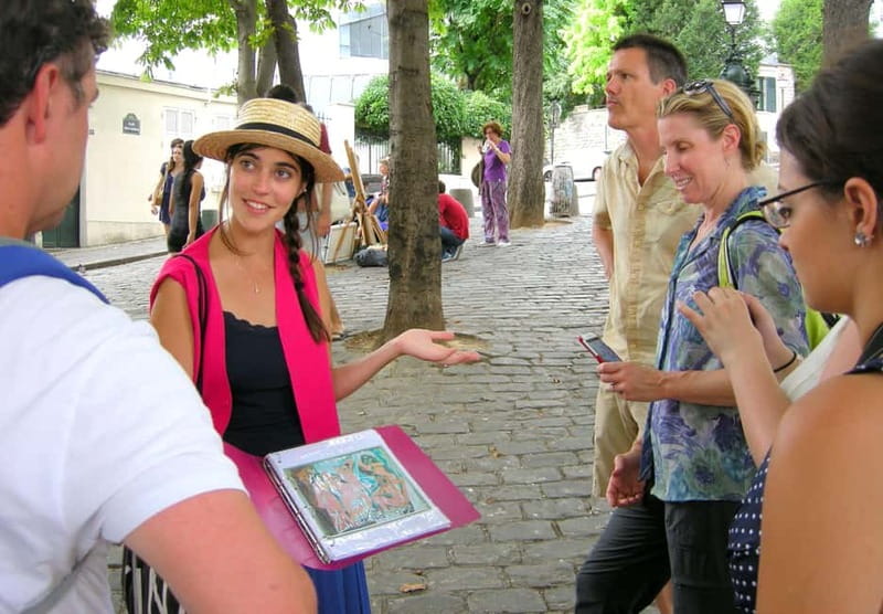 Paris: Montmartre Guided Walking Tour - Moulin Rouge: famous signage, plus cabaret lore beyond the postcards