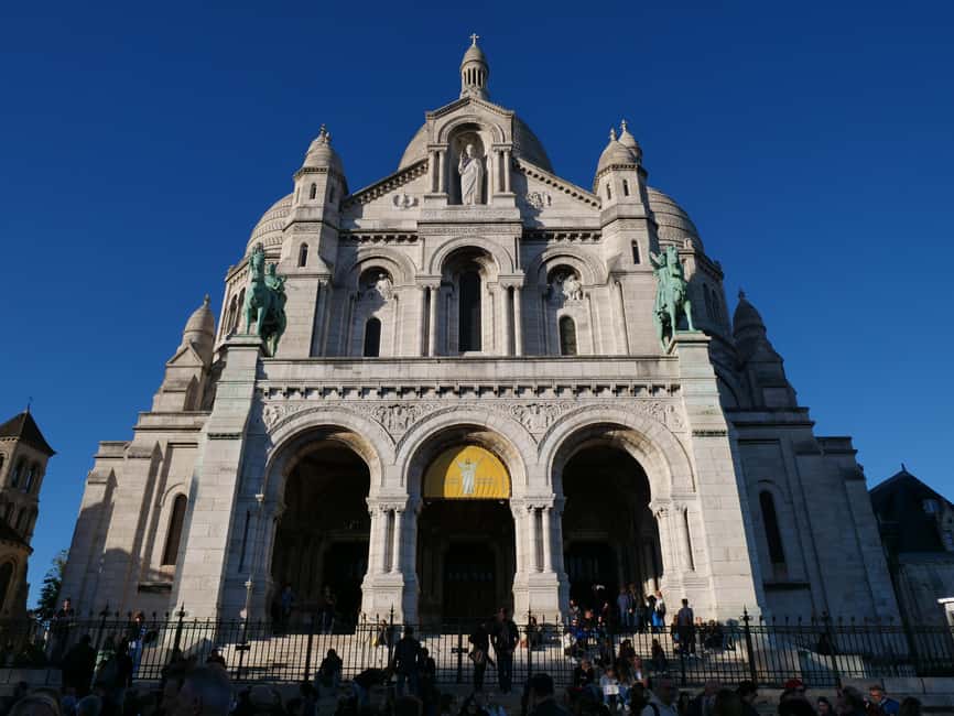 Paris: Montmartre Must-See Walking Tour with a Local Guide - Dali Museum and Cabaret Au Lapin Agile: surreal art and stage legends