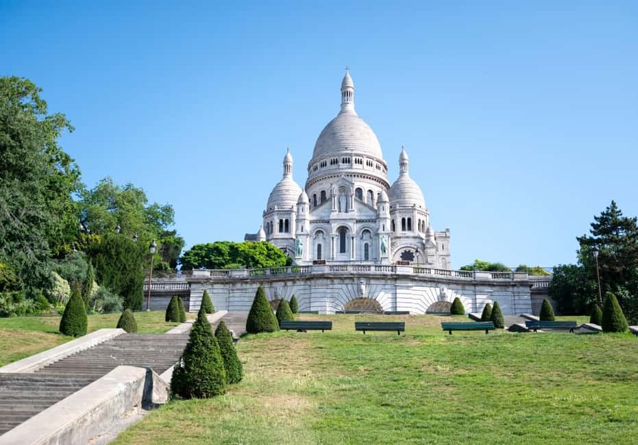 Paris: Montmartre, Notre-Dame, & Louvre Tour with Cruise - The Wall of Love, Moulin de la Galette, and Place du Tertre: quick stops that still feel real
