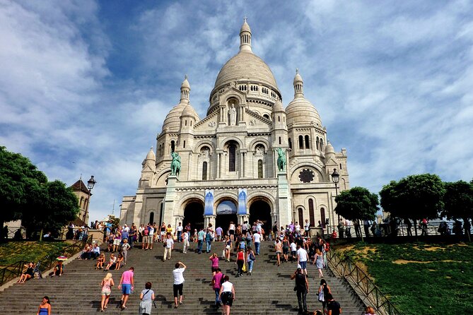 Paris Montmartre Private Walking Tour - Best Art, Culture, Food - Marcel Aymé’s wall-walking sculpture and Montmartre’s odd humor