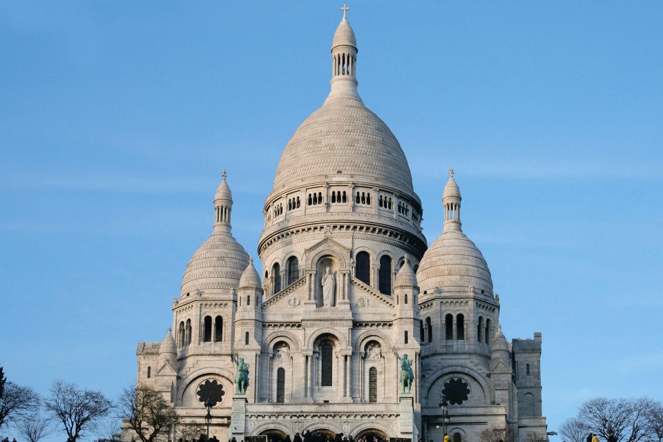Paris: Montmartre Small Group Guided Walking Tour - Dalida and the art of noticing statues and names