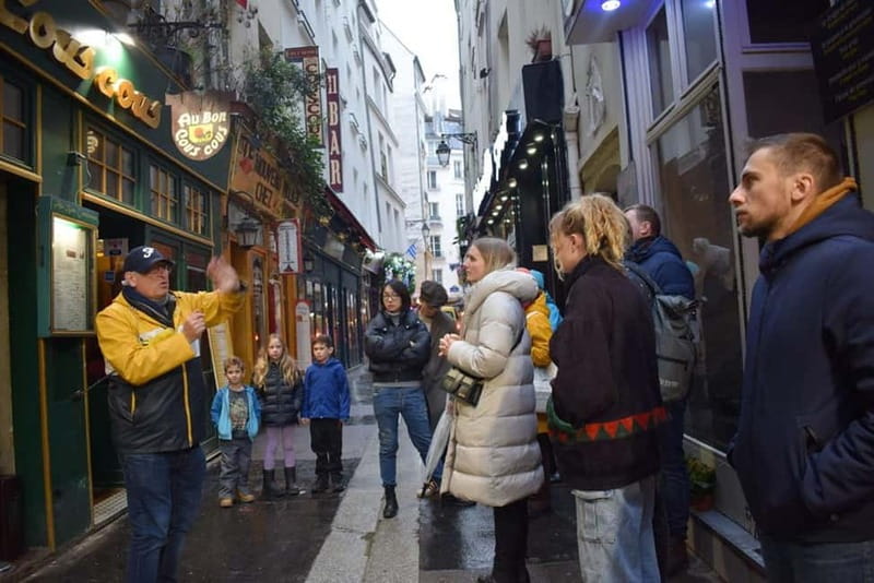 Paris: Notre-Dame Exterior and Latin Quarter Guided Walk - Bookshops, cafés, and courtyards: the Latin Quarter’s living texture