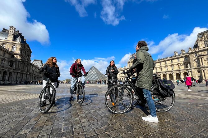 Paris : Private electric bike tour with wine and cheese tasting - Place Dauphine and Paris’s oldest bridge