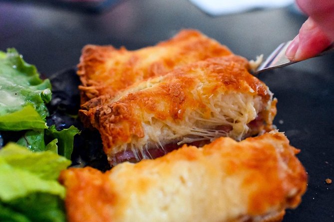 Paris Private Food Tour – Taste 8+ French Classics in Le Marais - National Archives museum area: where snack time meets serious Paris