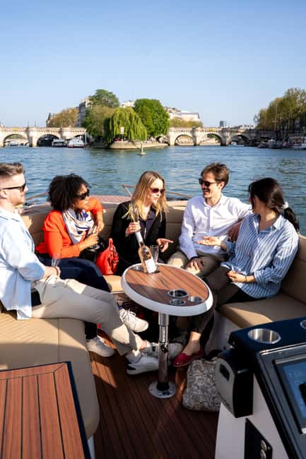 Paris: Private Small Boat Cruise with Rosé and Macarons - Cruising Toward the Eiffel Tower from the Seine’s Best Angle