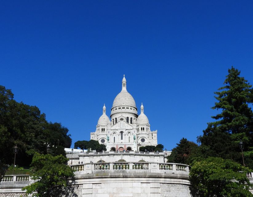 Paris: Sacré-Coeur and Montmartre Tour with Expert Guide - Meet at Carrousel de Saint-Pierre: How to Start Without Stress