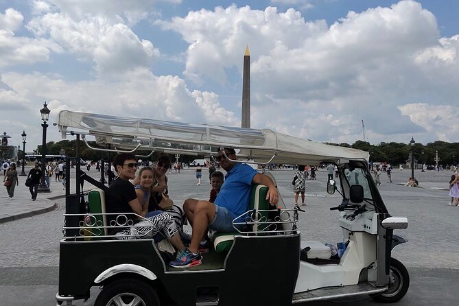 Paris Sightseeing by Tuk Tuk Golf Cart 2 hours - The guide makes or breaks it: Jules, Kenny, and Félix as examples