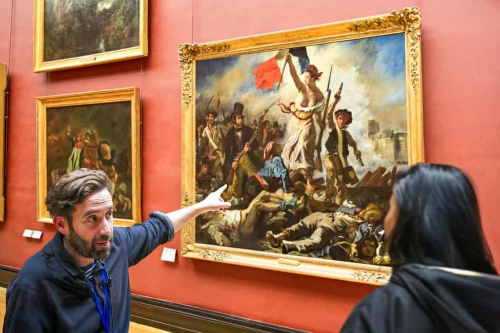 Paris: Skip-the-Line Louvre Museum & Mona Lisa Guided Tour - The Louvre Pyramid photo stop: quick orientation, not wasted time