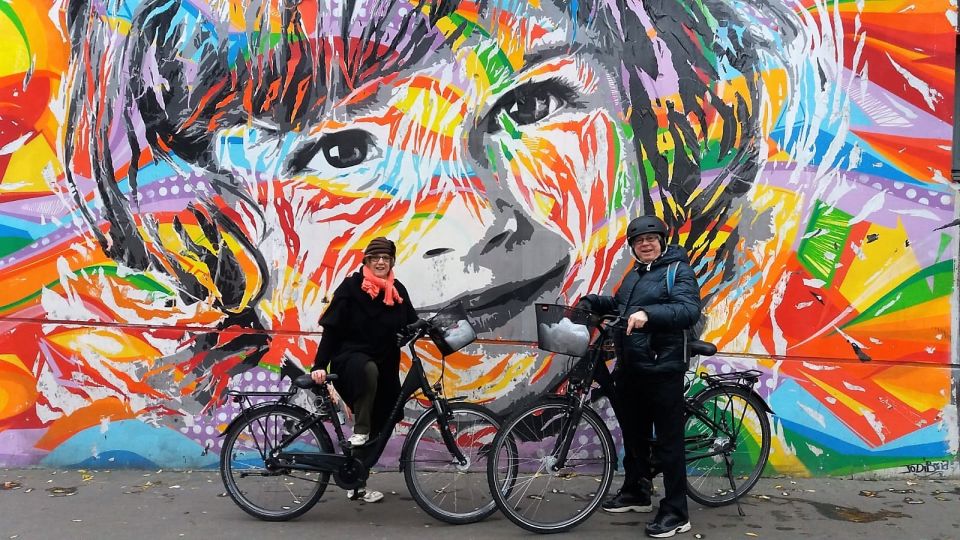 Paris: Street Art Open-Air Museum Bike Tour - Finding the bikes: Hôtel de Ville, the elevator, and the red umbrella