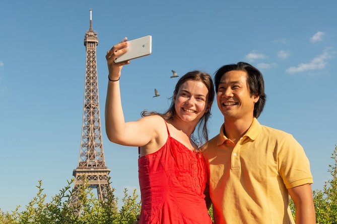 Paris Tour with Lunch at the Eiffel Tower and Seine River Cruise - The coach loop: big sights from the bus, with audio in 10 languages