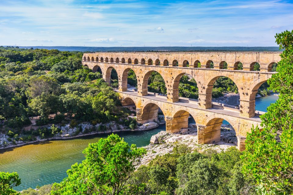 Pont du Gard, Uzès & Nîmes: Half-Day Tour with Entry Fees - Uzès medieval town walk: where the Roman-era story shows up in everyday streets