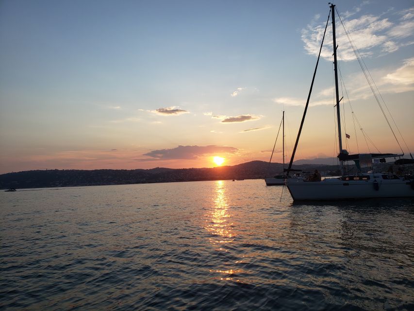 Private catamaran trip in the Bay of Juan les Pins at sunset - Summer swimming and winter comfort