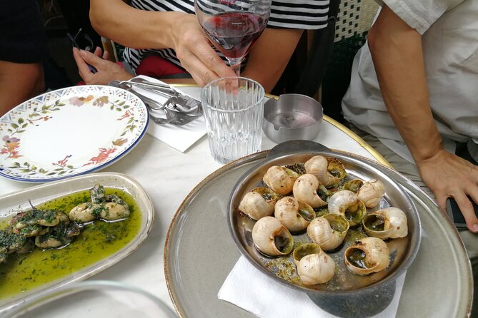 Private Foodie Tour in Paris: Exquisite French Cuisine - What you’ll likely eat: cheese, escargots, and sweet crêpe