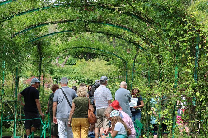 Private Giverny & Versailles Day Trip with Lunch & Hotel Transfers from Paris - Lunch at Moulin de Fourges breaks up the touring