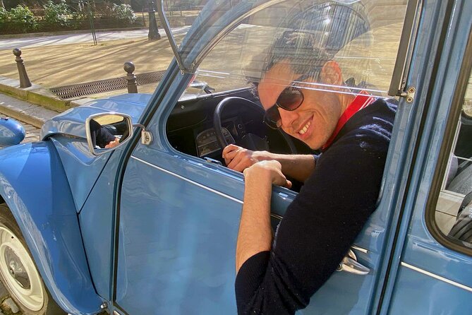 Private Tour of Paris in a convertible citroën 2CV - The grand boulevard feeling: luxury boutiques and famous brasseries