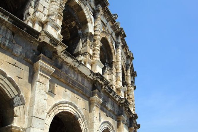 Roman Sites and Historical Places Day Trip from Avignon - Stop 1: Arenes de Nîmes—Rome’s arena, still active