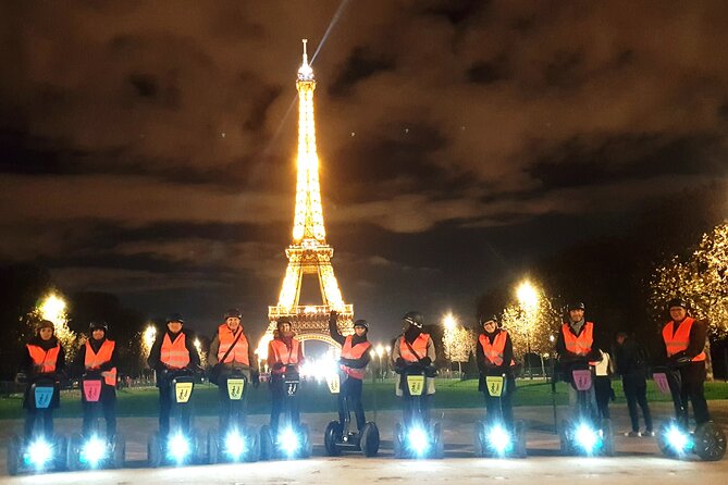Segway by night ! Illuminated Paris - Flamme de la Liberté and Passerelle Léopold-Sédar-Senghor: A Softer, More Reflective End