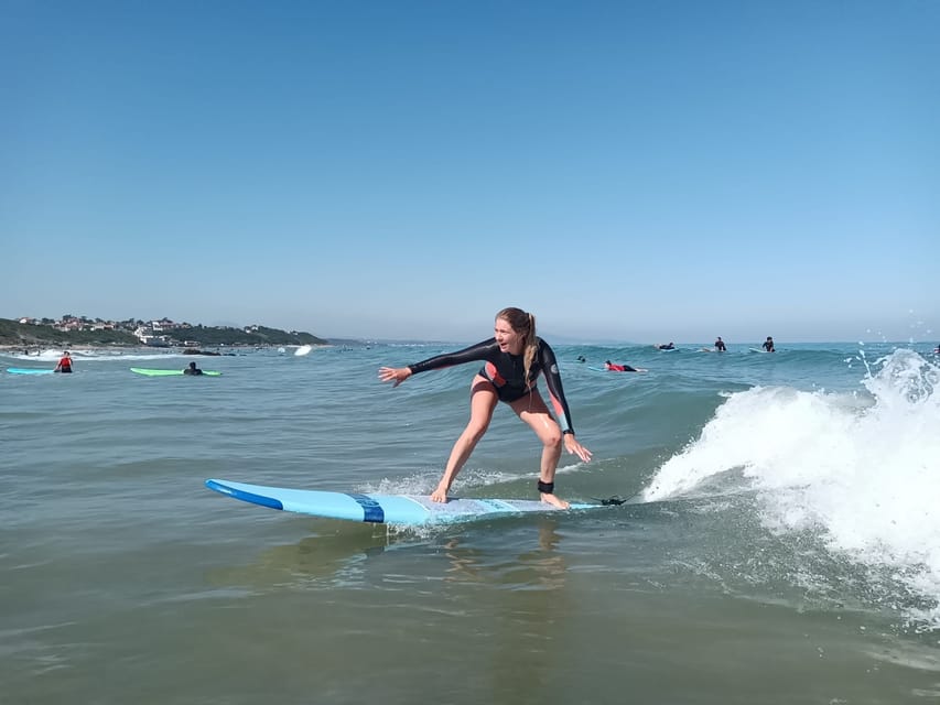 Surf Lessons in Bidart/Biarritz - All Equipment Included - Entering the water with instructor support