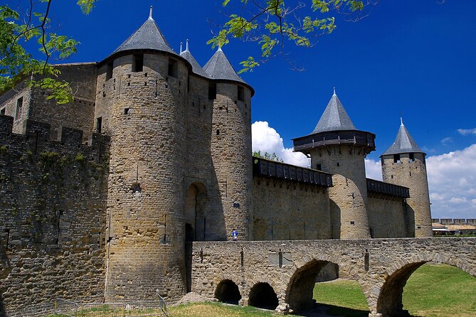 Toulouse : Carcassonne Day Trip by Coach with audio guides - Château Comtal and ramparts: make the most of the last guided ticket moment