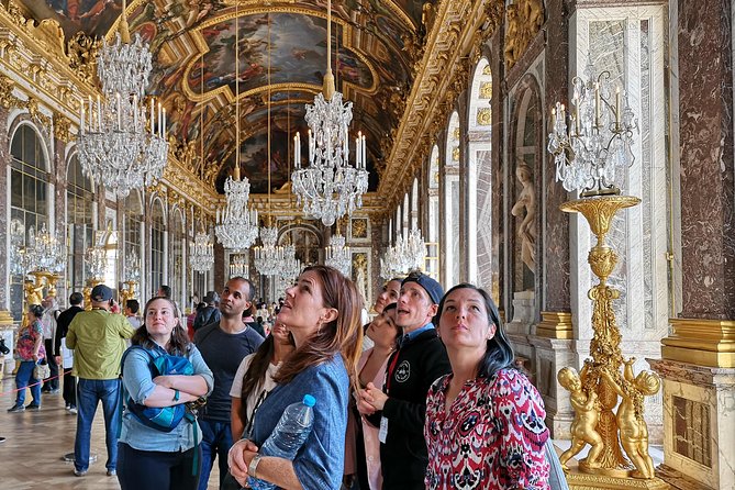 Versailles Bike Tour with Market, Gardens & Guided Palace Tour - Stop at the Château Front: Setting the Scene Before Crowds Swallow You