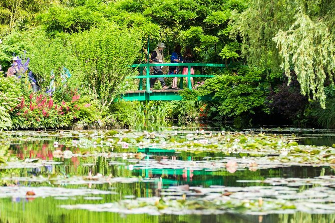 Versailles Timed Entrance Ticket and Giverny Small Group Day Trip from Paris - Morning in Giverny: Clos Normand, the footbridge, and Monet’s home