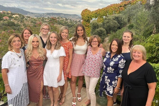 Viator Exclusive: Local Cooking Class & Dinner with View of Nice - The view and the vibe: olive trees, patio lights, and family energy